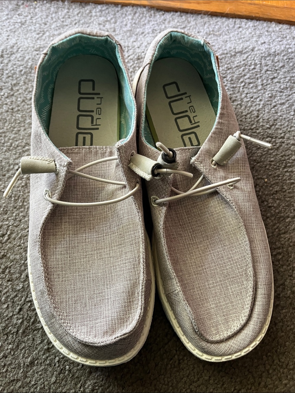 Hey Dude women’s Wendy Slip-On Loafers in Light tan beige with Teal Liner